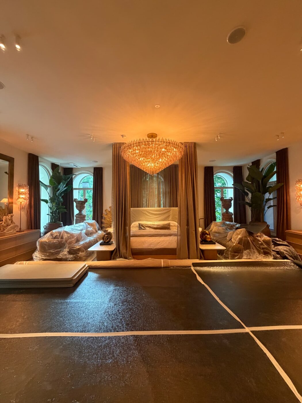 Crystal chandelier and bedroom lighting installation