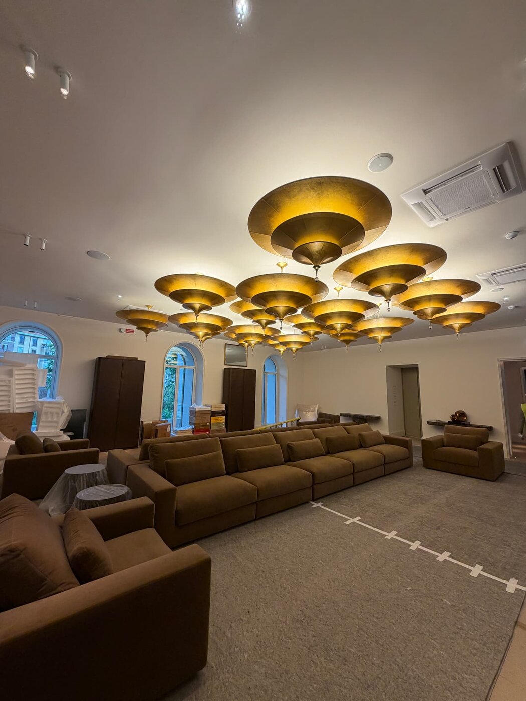 Pendant lighting installation on a high ceiling